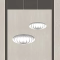 Two Modern White Pleated Pendant Lights Hanging Against Gray Wall 3d model