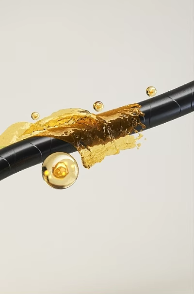 Black Tube With Golden Yellow Liquid Dripping And Small Droplets Around 3d model
