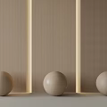 Light Brown Wall Paneling with Vertical Lines and Illuminated Strips Fronted by Three Wooden Spheres