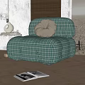 Puffy Green Plaid Single Sofa On Wooden Floor With Plant And Vase