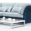 Light Blue Sectional Sofa with Dark Blue Accents Gray Pillows Throw Blanket and Coffee Table