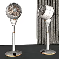 Two Air Cooler Fans with White and Orange Design Standing in Modern Room