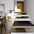 Open Plan Modern Living And Dining Space With Wood Furniture And Elegant Golden Decor Details