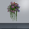 Wall Mounted Potted Plant With Various Colored Flowers Pink Orange Purple And Green Trailing Vines