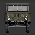 Olive Green Military Truck Featuring Canvas Covered Cargo Bed And Large Off Road Tires