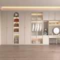 Modern Walk In Closet Interior With White Cabinets Glass Doors And Dressing Table Mirror
