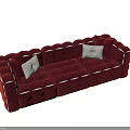 Burgundy Velvet Three Seater Sofa With Tufted Design And Decorative White Cushions