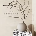 Minimalist White Spherical Vase with Dry Branches on Marble Stand for Interior Decor