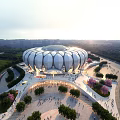 Modern Circular Public Venue With Green Surroundings Pathways And People