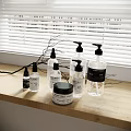 Stylish Bathroom Accessories With Transparent Pump Bottles Lidded Jar And Natural Labels On Wooden Countertop