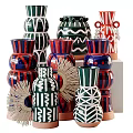 Artistic Ceramic Vessels With Bold Colors Geometric Patterns And Wavy Designs