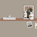 Stylish Wooden Shelf Decor With Rabbit Figurines Books And Framed Art Cards