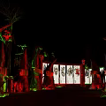 Cartoon Style Enchanting Forest Night View With Red Green Tree Trunks And Decorative Screen Structures