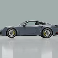 Gray Sleek Sports Car With Two Door Design And Sporty Alloy Wheels For Modern Driving