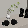 Minimalist Shelf Display With White Vase Green Plant Black Speakers Gray Items