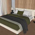 Comfortable Double Bed With Green And White Pillows Dark Blanket Wooden Wall And Nightstand Lamp