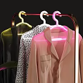 Stylish Clothes Hanger with Hanging Shirts Round Mirror Green Plant and Decorative Vases