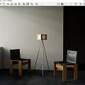 Black Leather Leisure Chairs With Wooden Frames And Tripod Floor Lamp In Indoor Space
