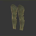 Ancient Bronze Leg Armor With Intricate Carved Patterns And Symmetrical Design