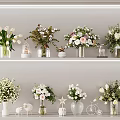 Vase Flowers Display On White Shelves With Decorative Figurines And Various Blooms