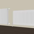 Sleek White Heating Radiators Against Light Wall With Wooden Floor In Home Interior