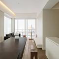 Minimalist Living And Dining Area Design With White Walls Wooden Floors And Long Black Table