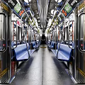 Metro Train Interior With Blue Seats Metal Handrails And Ceiling Lights