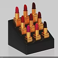 Elegant Decorative Ornament Set with Black Display Stand and Golden Case Lipsticks in Various Colors