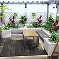 Cozy Roof Garden Design With Wooden Deck Pergola Swing Chair And Lush Green Plants