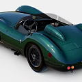 Green Classic Open Top Sports Car With Streamlined Bodywork And Vintage Design