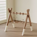 Wooden A Frame Baby Gym With Hanging Shape Toys And White Base