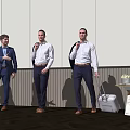 Professional Men in Formal Suits Standing Together Holding Jackets in Office Space