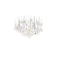 Artistic Modern Chandelier With Intricate Cutout Design Metallic Frame And Warm Glowing Lights