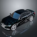 Black Modern Coupe Car With Sleek Aerodynamic Lines And Alloy Wheels