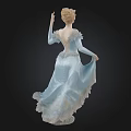 Graceful Female Ballet Dancer In Light Blue Flowing Dress With Black Background