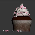 Chocolate Cupcake With White Frosting And Pink White Sprinkles On Black Background