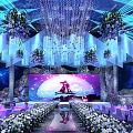 Luxurious Banquet Hall Decor With Hanging Crystal Lights Flower Arrangements And Stage Screen