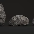 Three Rough Textured Animals Of Different Sizes On Black Background