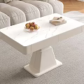 Modern White Coffee Table With Sofa Pillows Floor Lamp And Potted Plant On Wooden Floor
