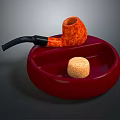 Orange Textured Tobacco Pipe On Round Red Ashtray With Cork Stopper