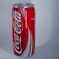 Coca Cola Carbonated Soft Drink In Aluminum Can With Red And Silver Design