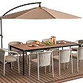 Outdoor Table with Umbrella and Chairs on Wooden Deck for Leisure Dining
