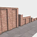 Outdoor Red Brick Wall Structures With Varying Heights And Gray Stone Pavement