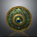 Ornate Circular Shield Weapon Featuring Golden Border And Peacock Feather Design