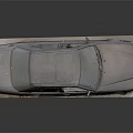 Old Rusty Car Display Model On Platform With Weathered Body And Wheels
