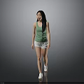 Woman In Green Tank Top And White Shorts Walking On Gray Background With White Shoes