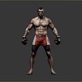Muscular Shirtless Man With Tattoos In Black Boxing Gloves Red White Shorts Against Gray Background