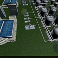 Aerial View Of Industrial Plant With Cooling Towers Storage Tanks Piping Systems On Green Grass