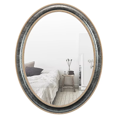 Oval Mirror With Gold And Black Frame Reflecting Bedroom Scene With Bedside Table And Vase 3d model