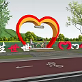 Scenic Waterfront Landscape With Red Heart Shaped Arch Bicycle Lane Trees And Benches